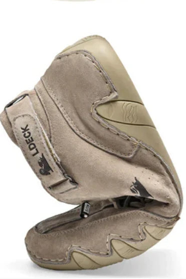 Detail of men's high-top trainers showing water-resistant outer finish and cushioned lining