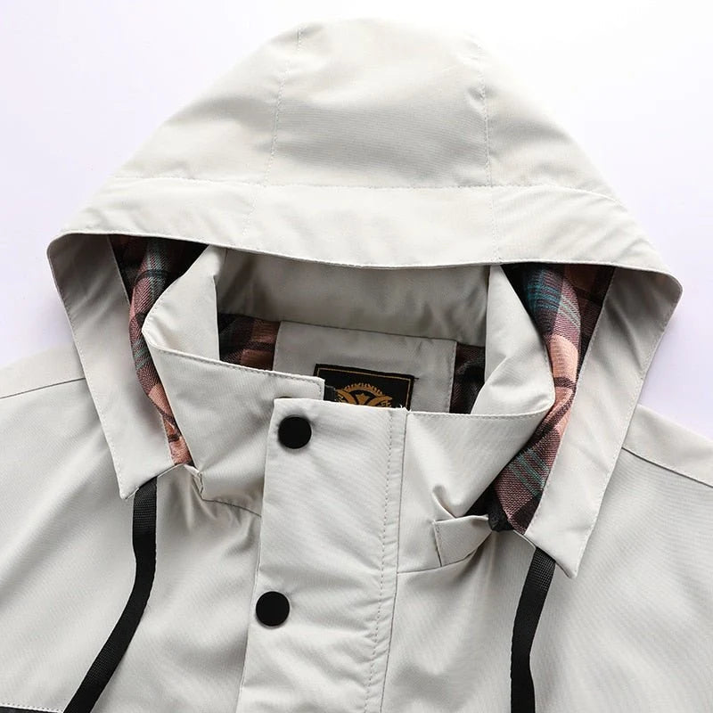 Men's parka jacket sleeve showing cuff adjustment and smooth fabric finish