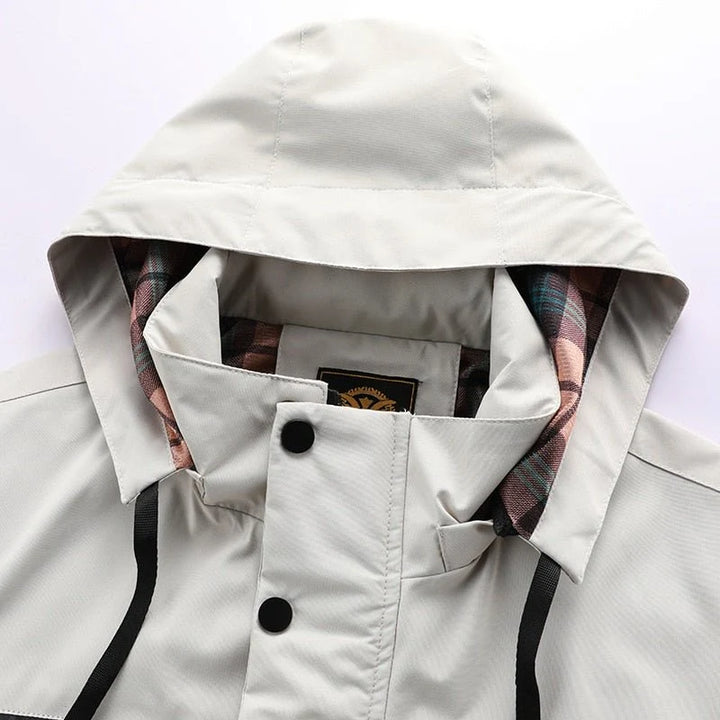Men's parka jacket sleeve showing cuff adjustment and smooth fabric finish