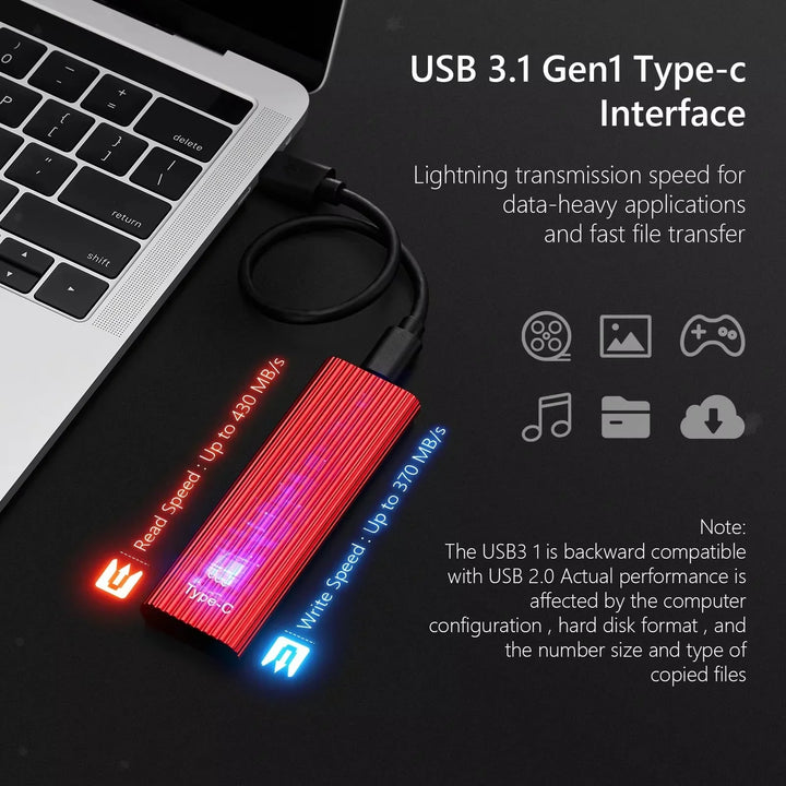 Compact external SSD drive with ribbed aluminium housing and attached USB cable for data transfer