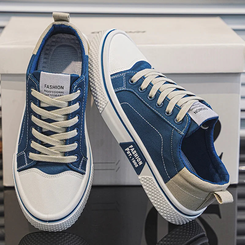 Women's canvas trainers in blue with beige laces and contrast stitching detail