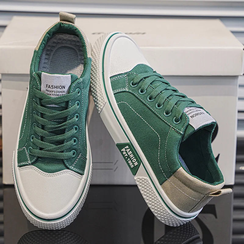 Close-up of women's low-top canvas trainers showing lace-up closure and rubber toe cap