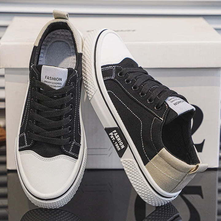 Women's canvas trainers displayed on neutral surface showing structured silhouette