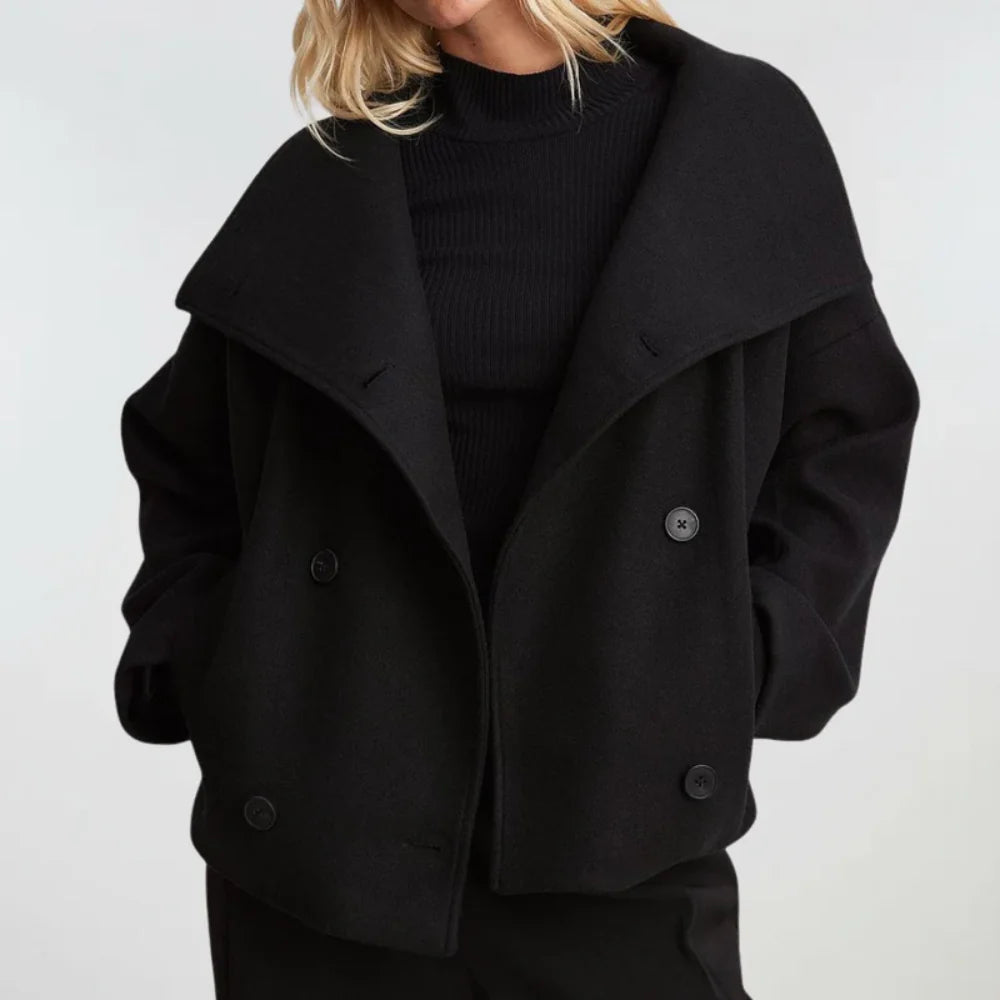 Women's cropped double breasted coat with wide lapels and structured tailoring in black