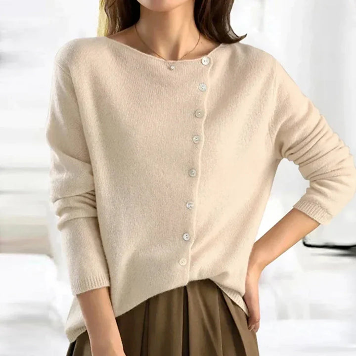 Side view of relaxed fit women's cardigan showing hip-length hem and fine knit drape