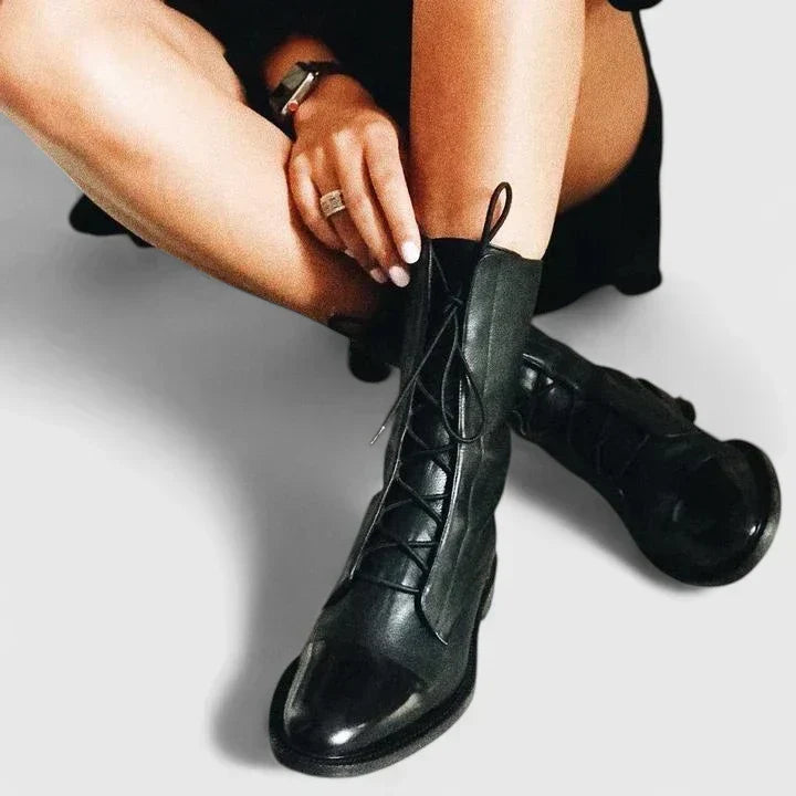 Women's lace-up ankle boots in black with chunky platform sole and structured finish