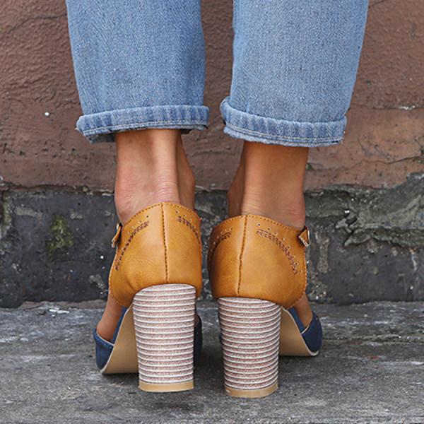 Detail shot of women's chunky block heel shoes showing contrasting colour panels and stitching