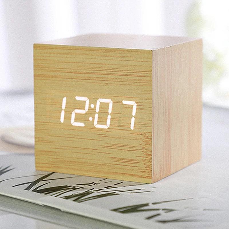 Compact wooden alarm clock with LED screen showing time and temperature for bedroom