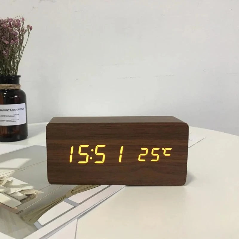 Wooden LED alarm clock in natural finish showing digital time display