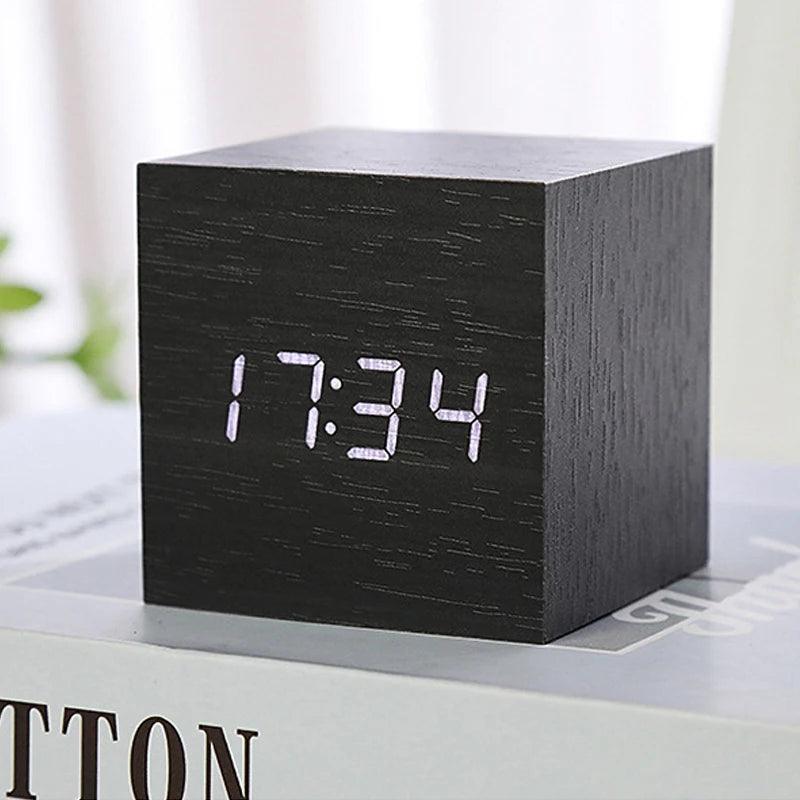Bedside wooden alarm clock with LED display and voice activation mode