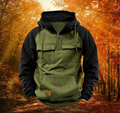 Men's colour-block zip-up hoodie with olive body and black raglan sleeves on autumn background