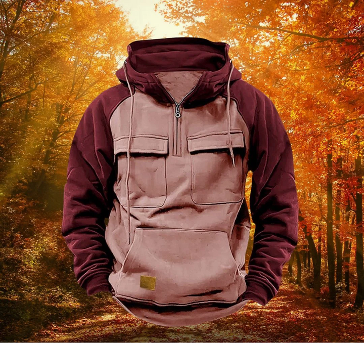 Side view of relaxed-fit men's hoodie showing raglan sleeve construction and kangaroo pocket