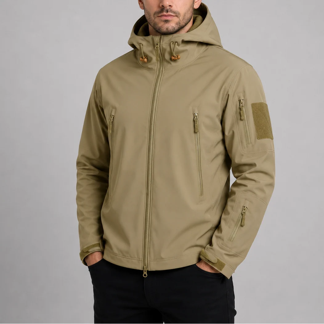 Detail shot of men's softshell jacket featuring full-length zip, high collar, and windproof construction