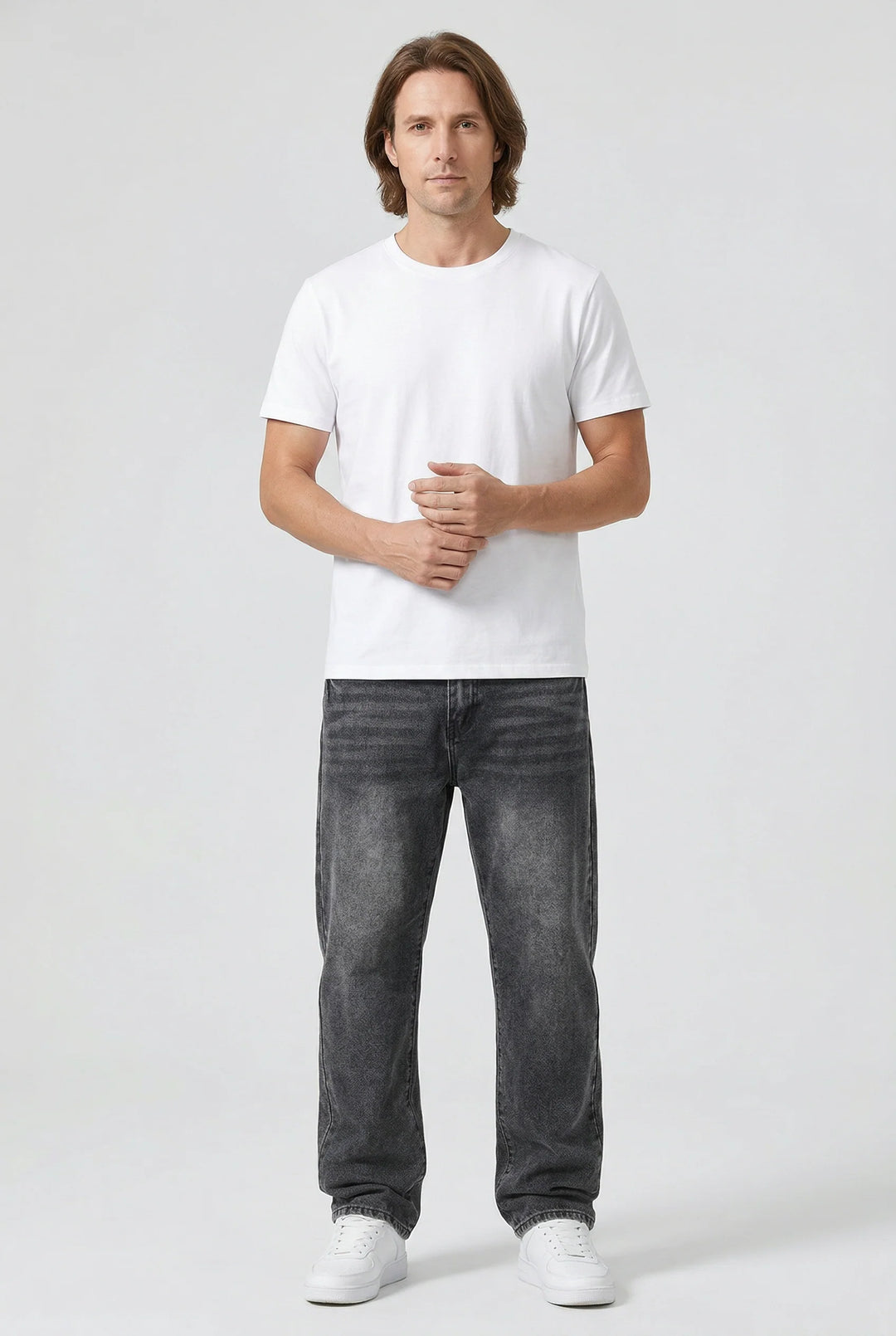 Front view of men's relaxed fit jeans showing straight leg silhouette and washed grey finish