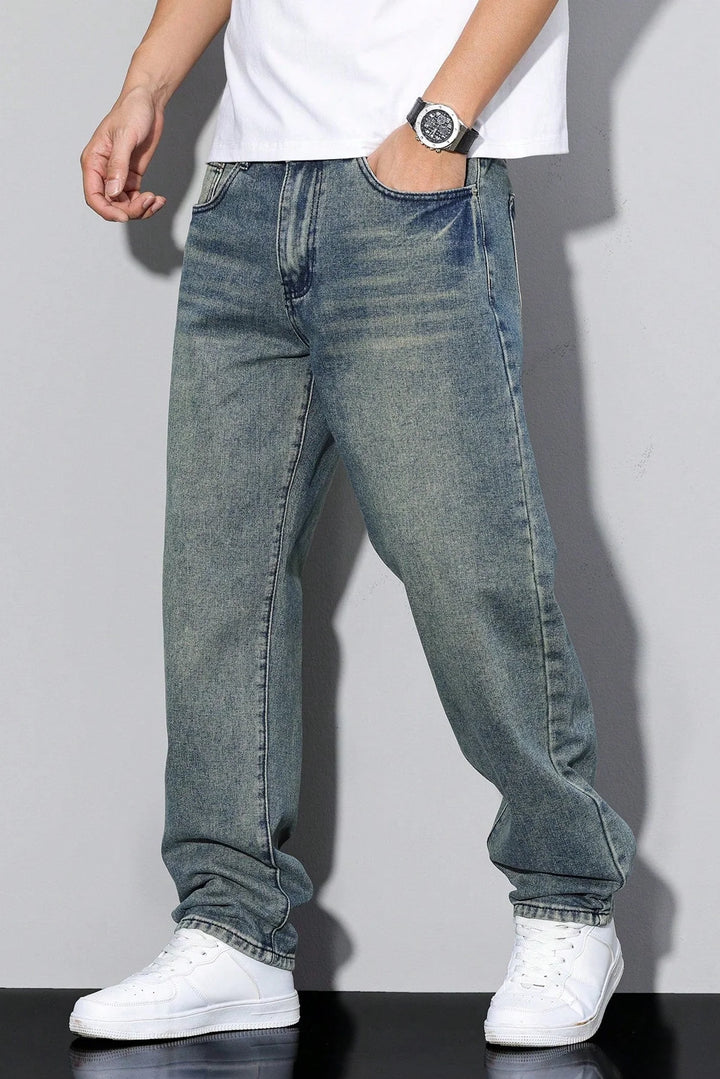 Back view of men's loose fit straight leg jeans showing rear pockets and seam detail