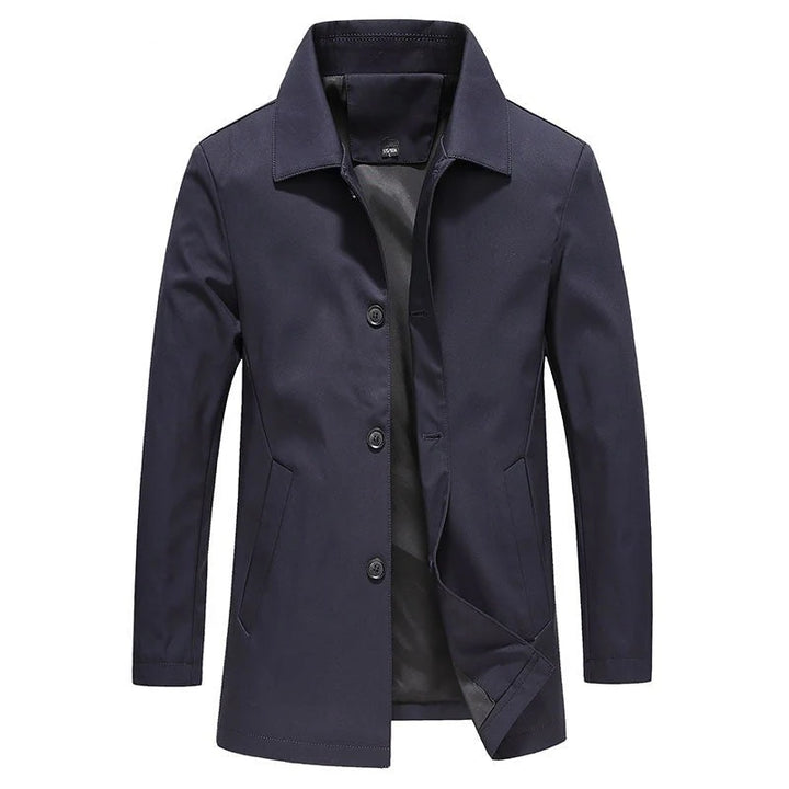 Side view of men's mid-length coat with functional pockets and clean lines