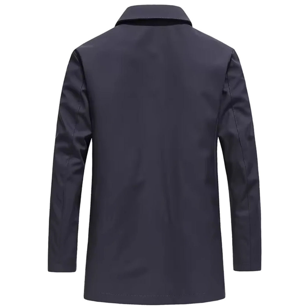 Men's tailored coat styled open showing smooth interior lining and refined cut