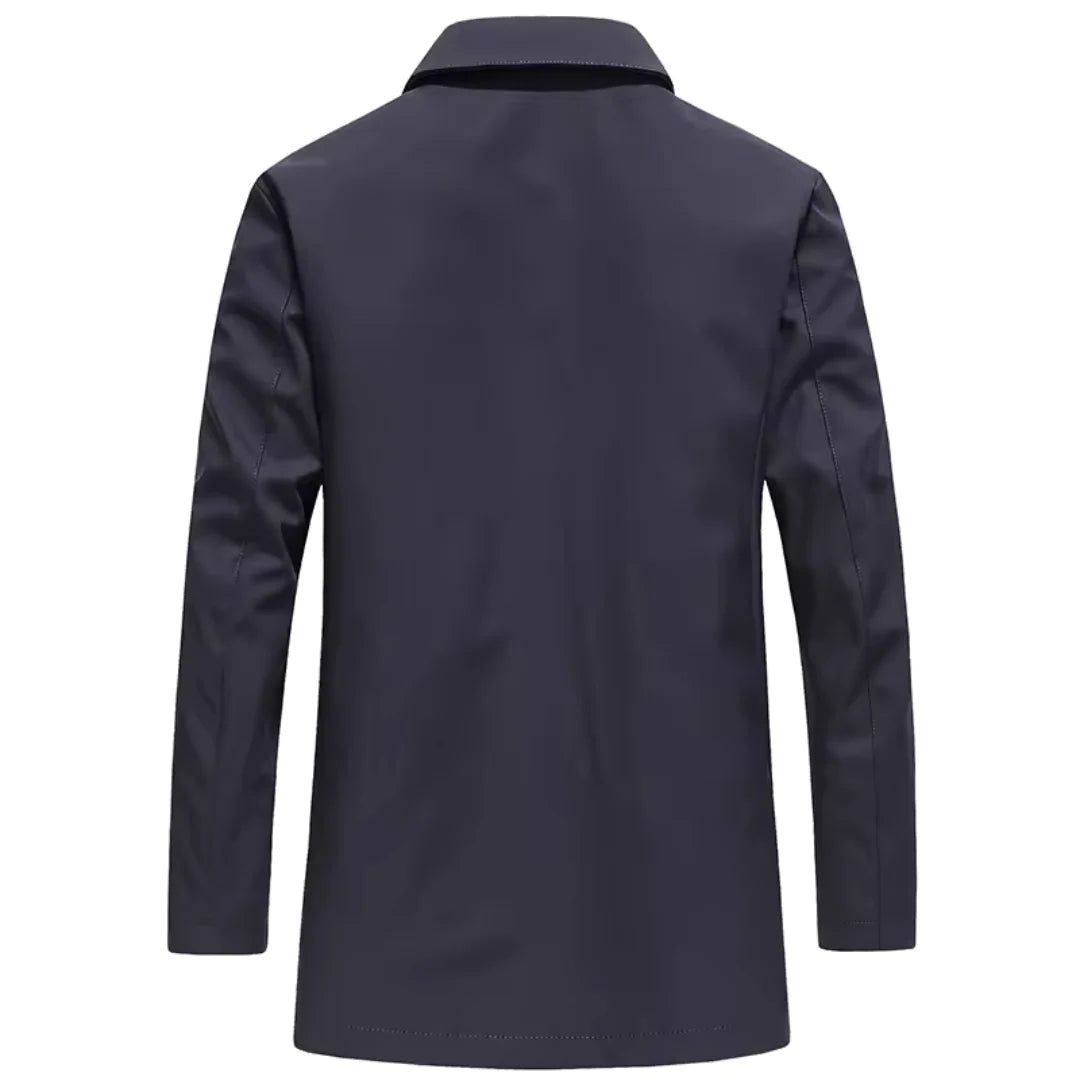 Men's tailored coat styled open showing smooth interior lining and refined cut