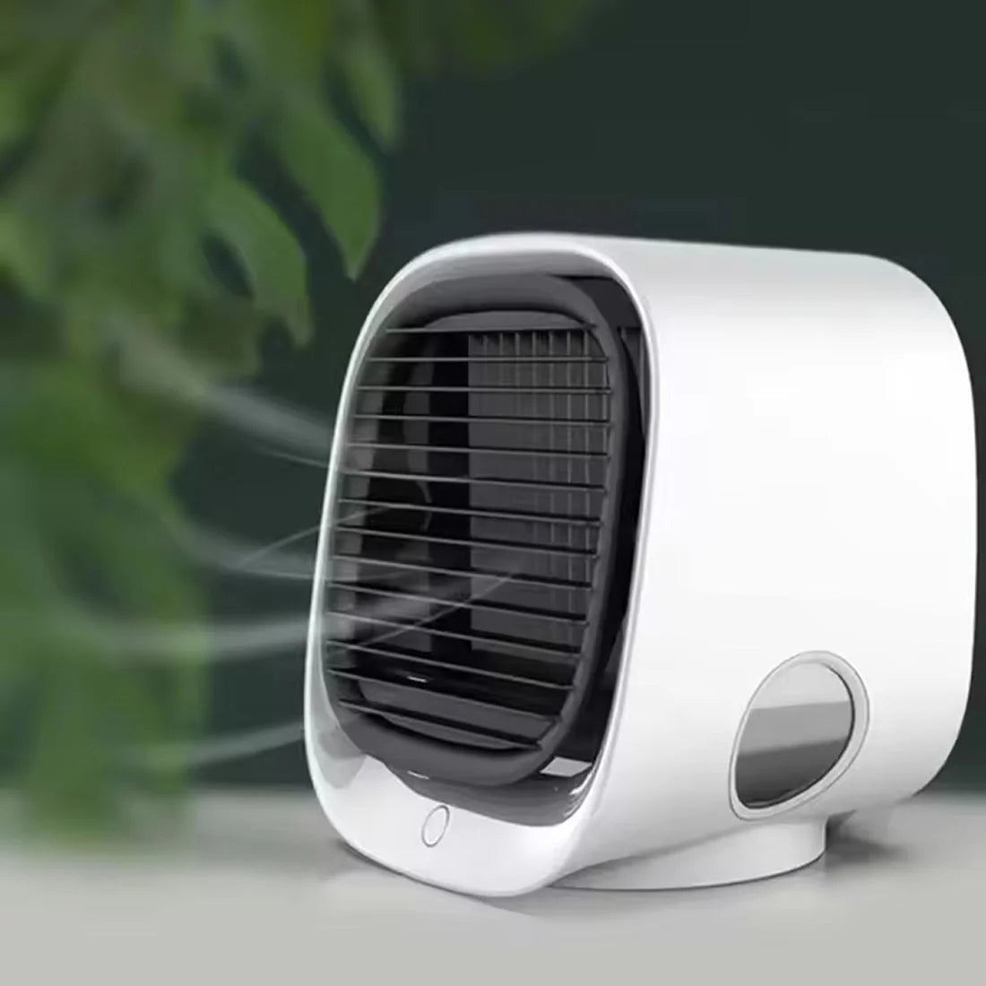 Personal evaporative cooler showing top water reservoir openings and compact footprint for small space cooling