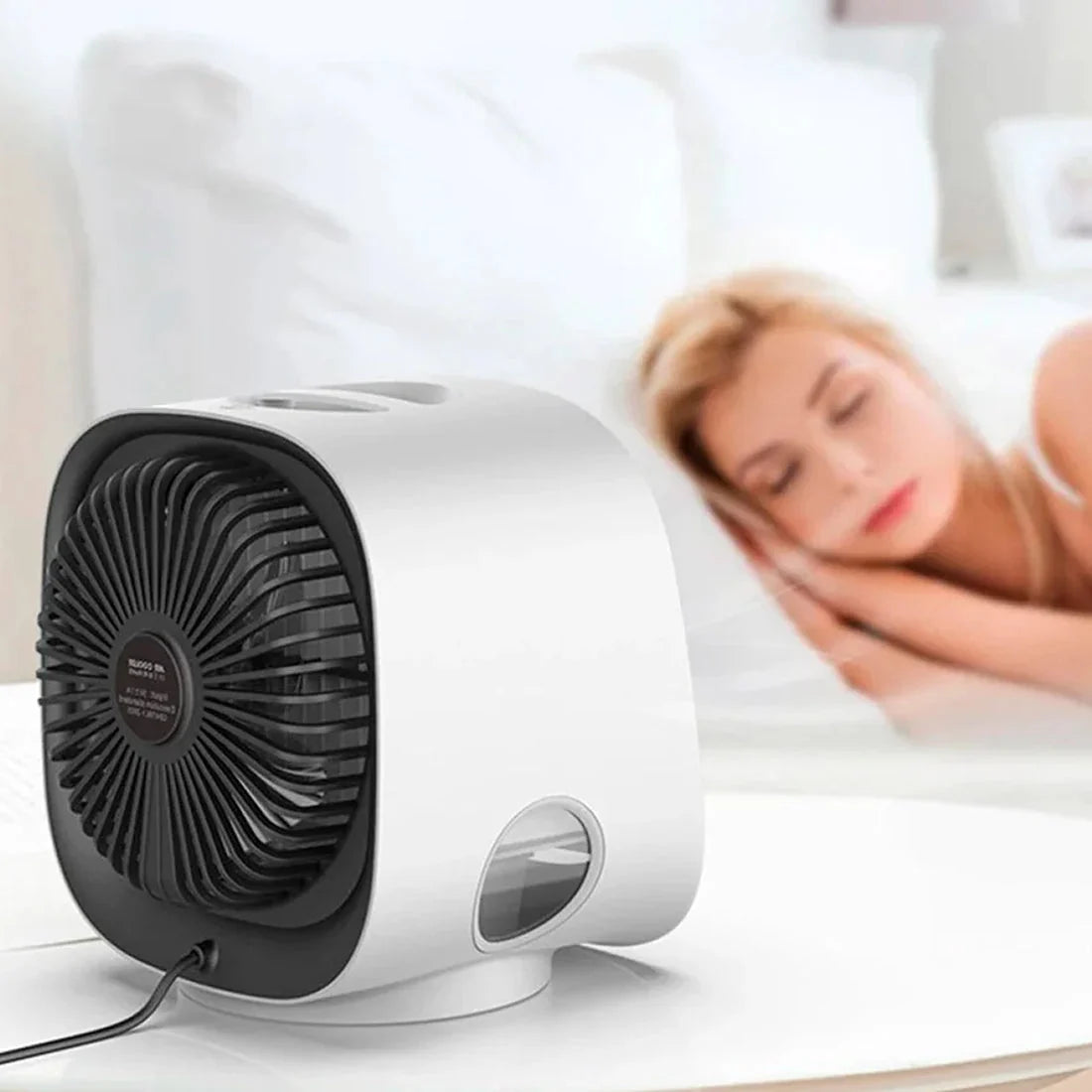 White portable air conditioning unit with USB-C connectivity and low-noise fan for bedroom or workspace use