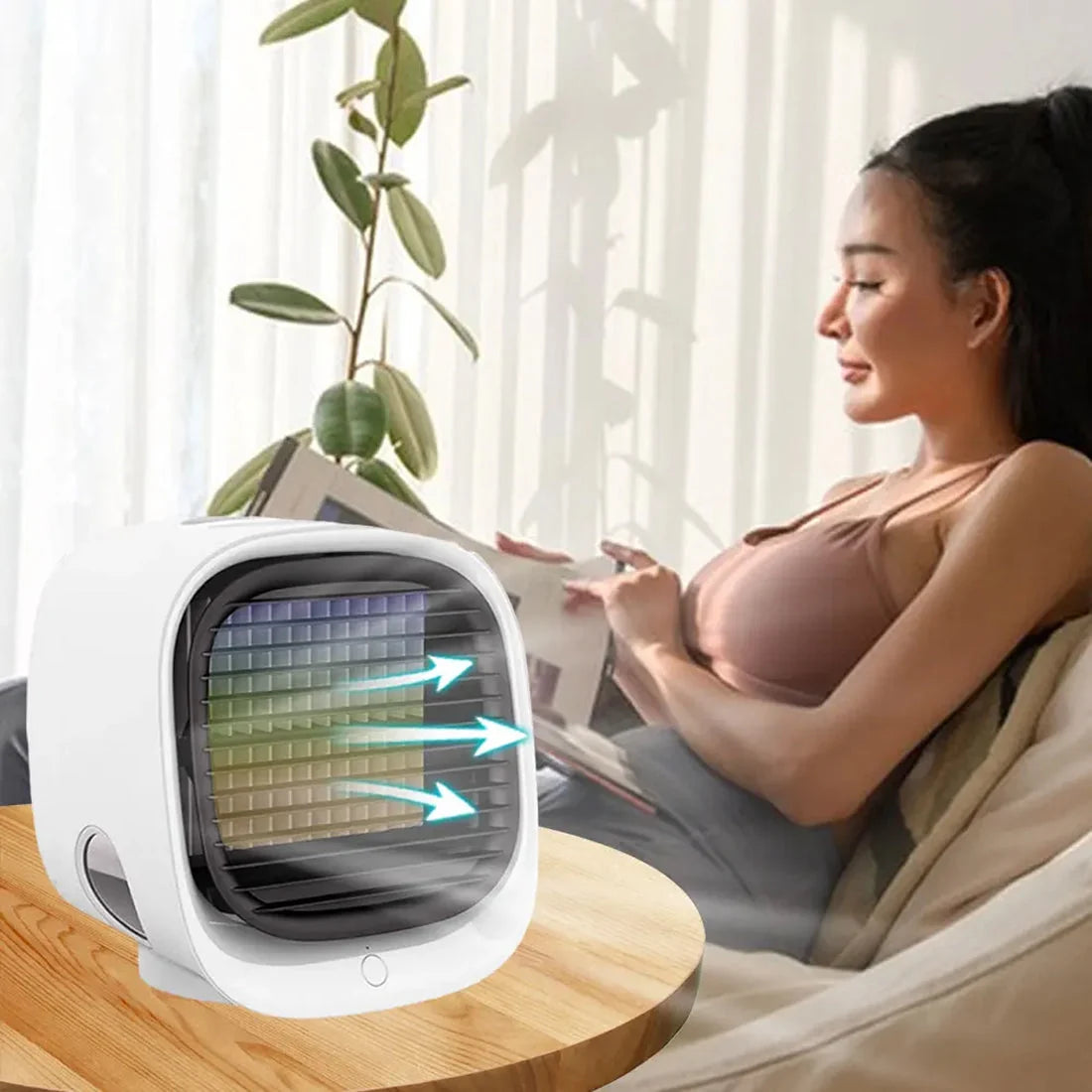 Compact air cooling device featuring modern white finish and dark ventilation panel for localised temperature relief