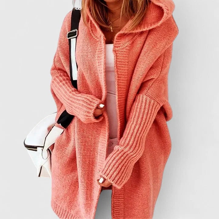 Women's oversized hooded cardigan in coral with ribbed sleeves and knee-length cut