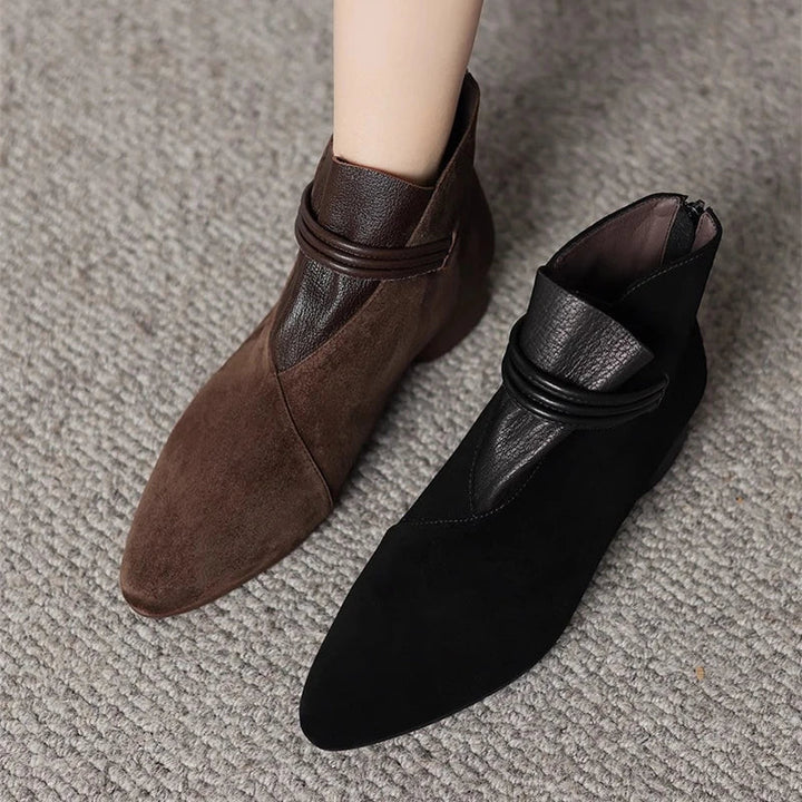 Women's suede ankle boots styled for autumn and winter wear