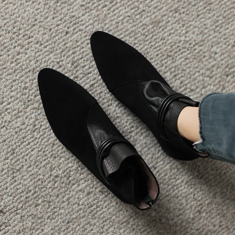 Full view of Charlotte women's suede ankle boots on white background