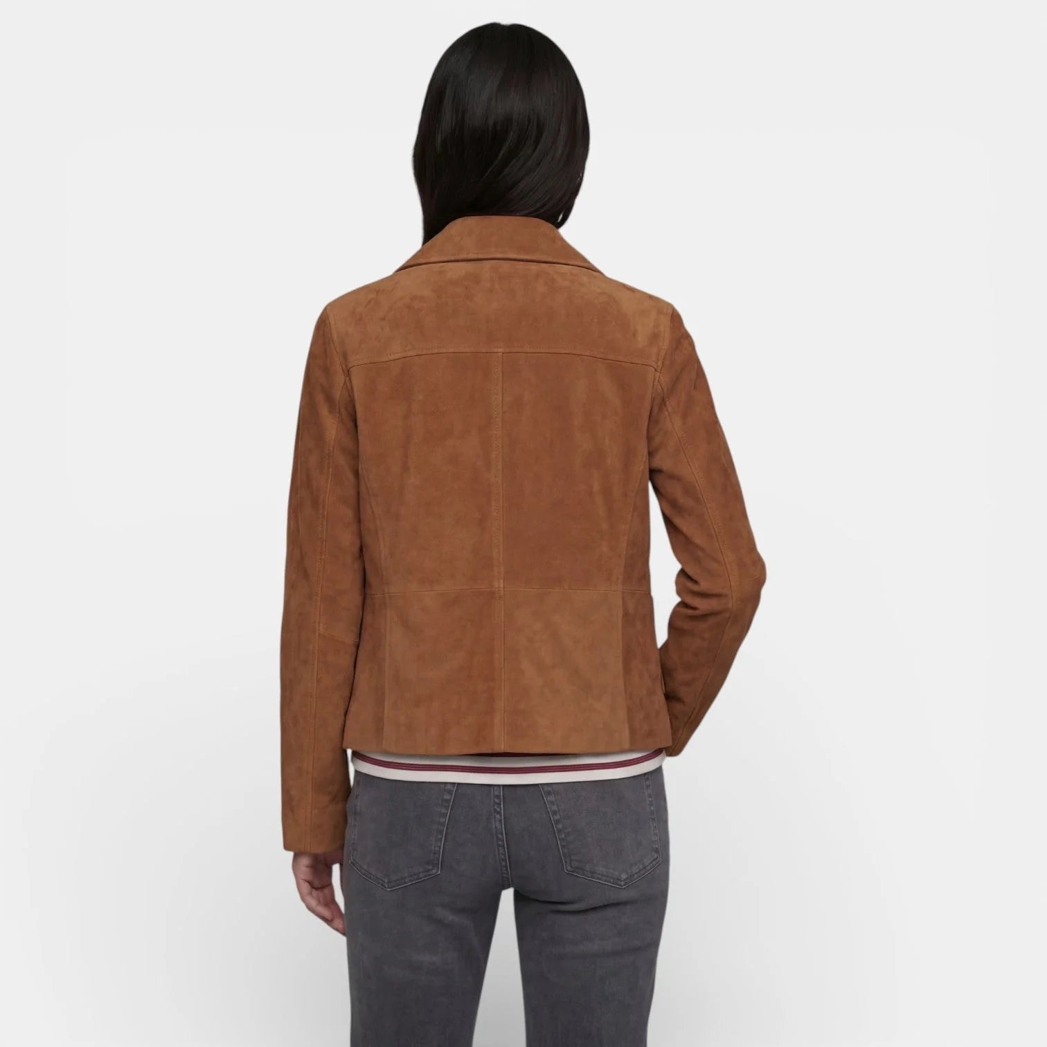 Side view of women's relaxed suede jacket featuring hip-length cut and patch pockets