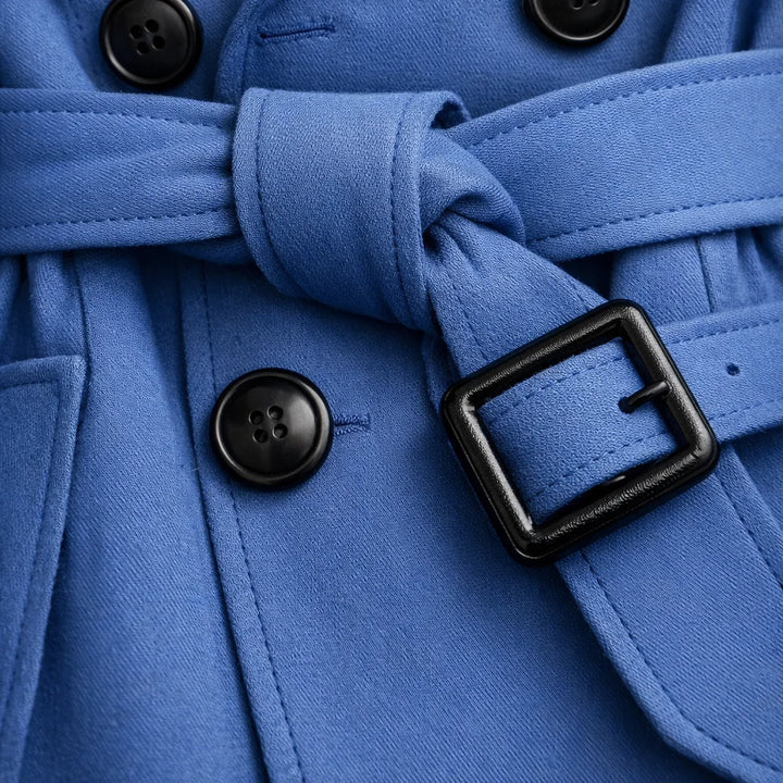Longline trench coat with buckle cuff details and smooth structured fabric drape