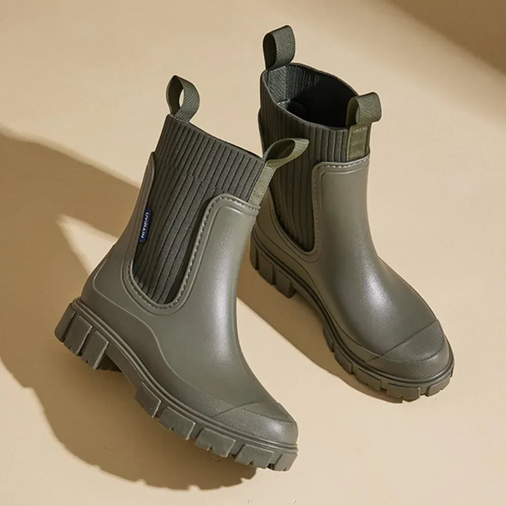 Close-up of women's Chelsea rain boot elasticated side panel and ribbed knit ankle detail
