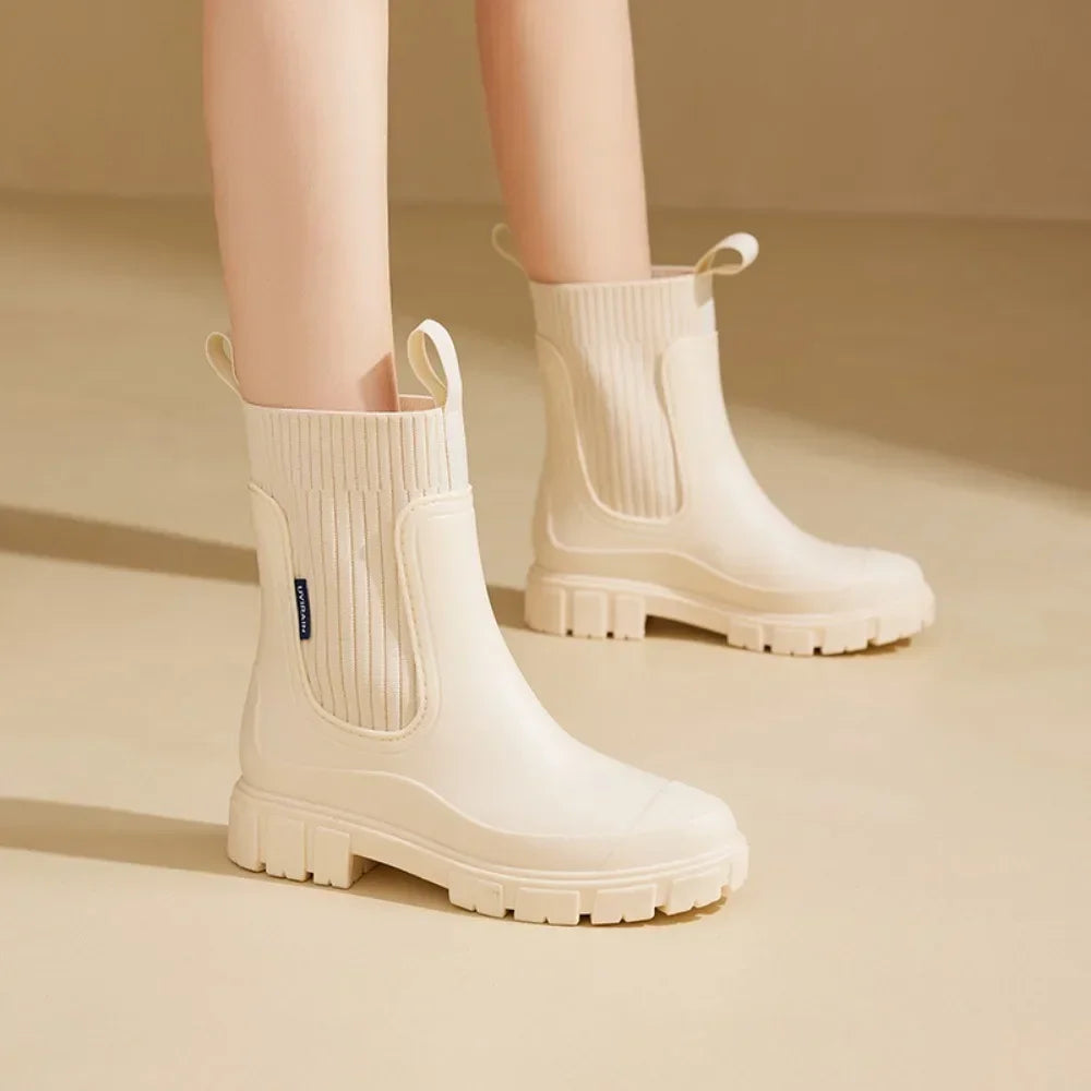 Women's Chelsea rain boots collection showing five colour options and waterproof construction