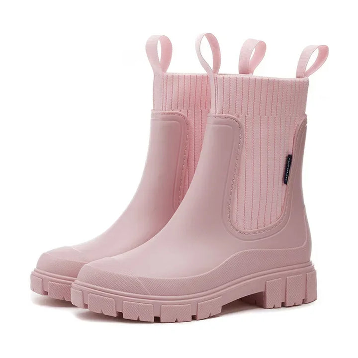 Back view of women's Chelsea rain boots showing heel pull tab and chunky sole construction