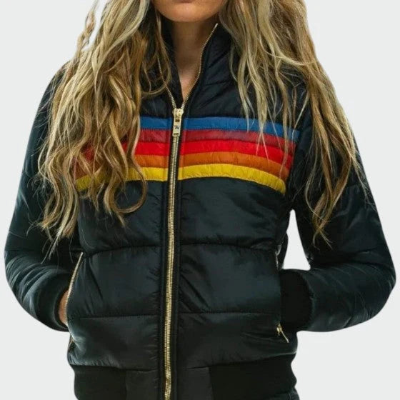 Side view of women's cropped puffer jacket with ribbed cuffs and hem in mustard contrast colour