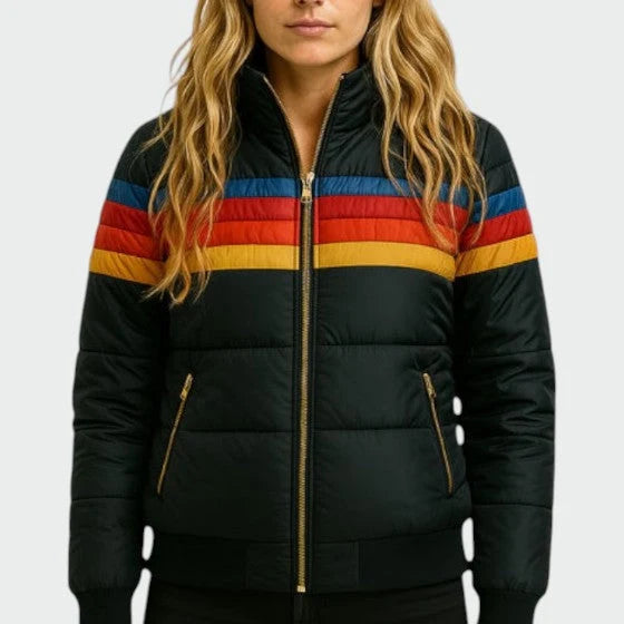 Women's puffer jacket styled with dark jeans showing cropped length and stand collar design