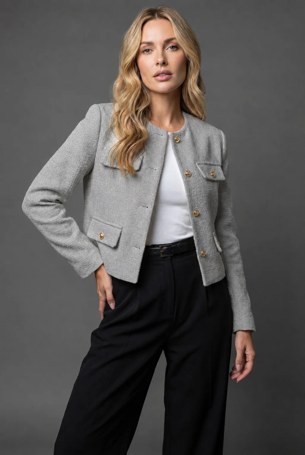Light blue collarless blazer with textured tweed finish