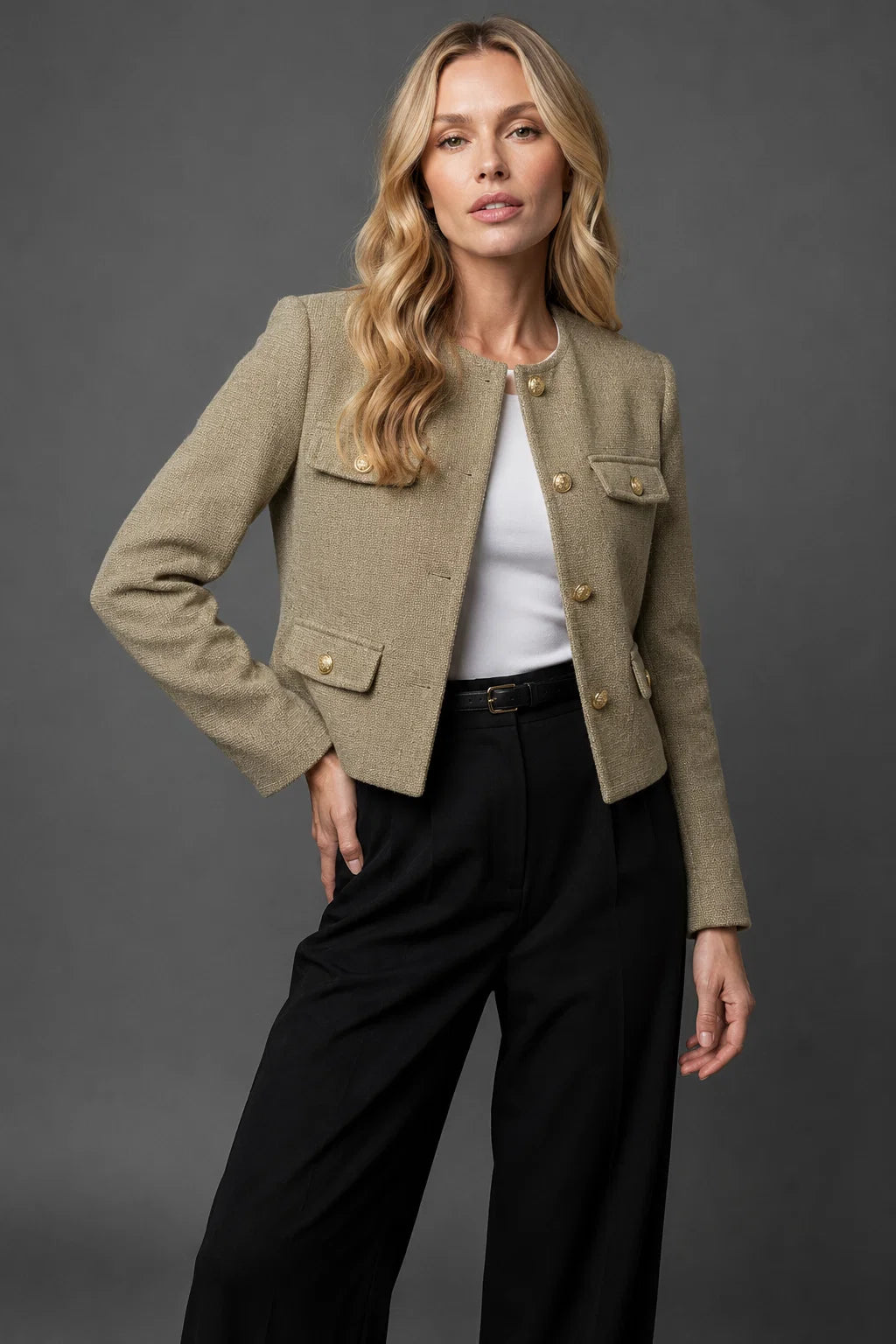 Textured tweed blazer with gold button closure and flap pocket detail