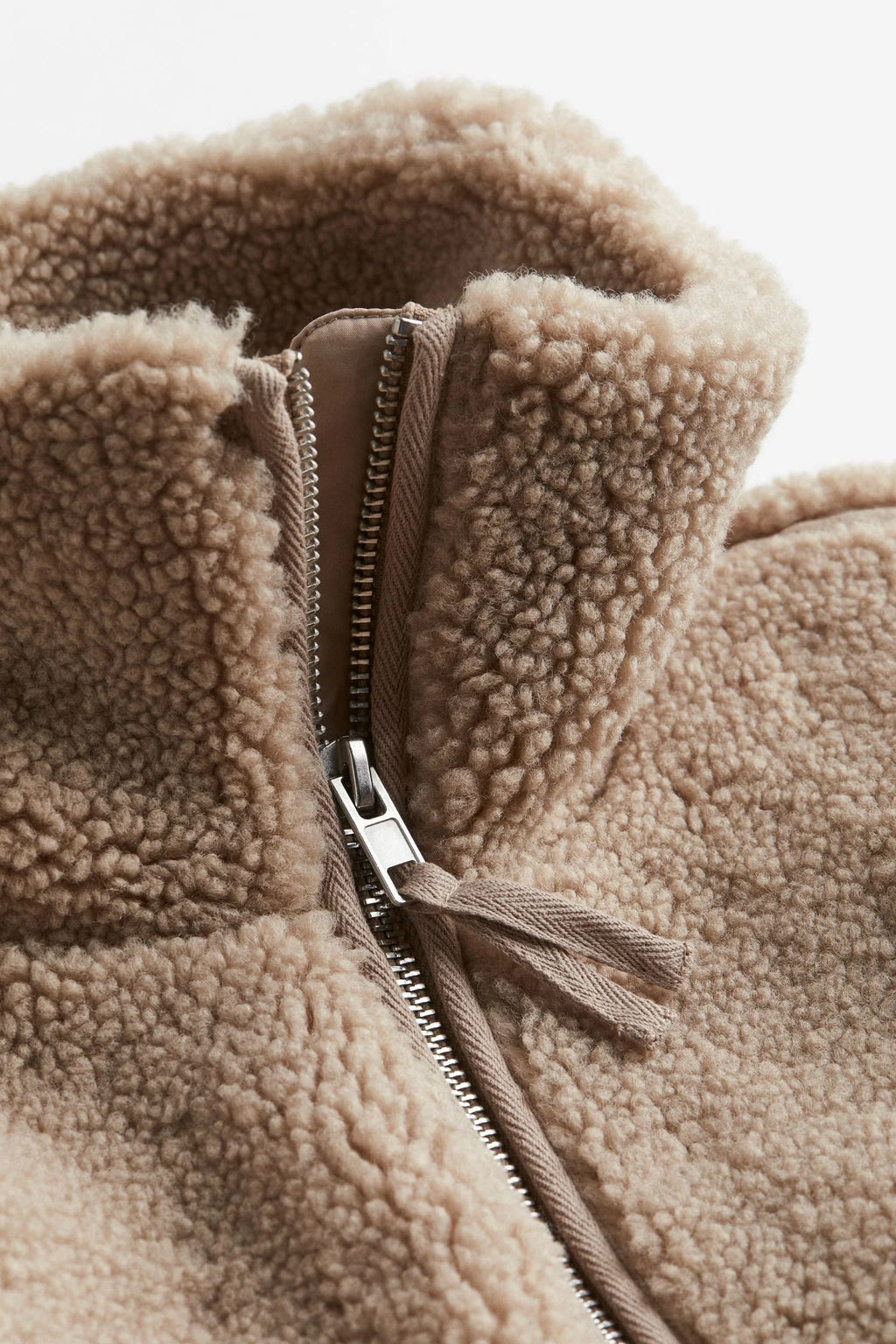 Rear view of the oversized teddy fleece jacket highlighting the relaxed, roomy cut