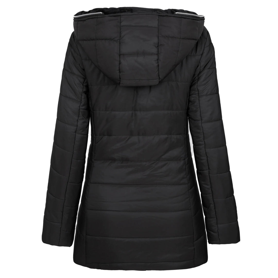 Side view of women's puffer jacket featuring zip pockets and mid-thigh length silhouette