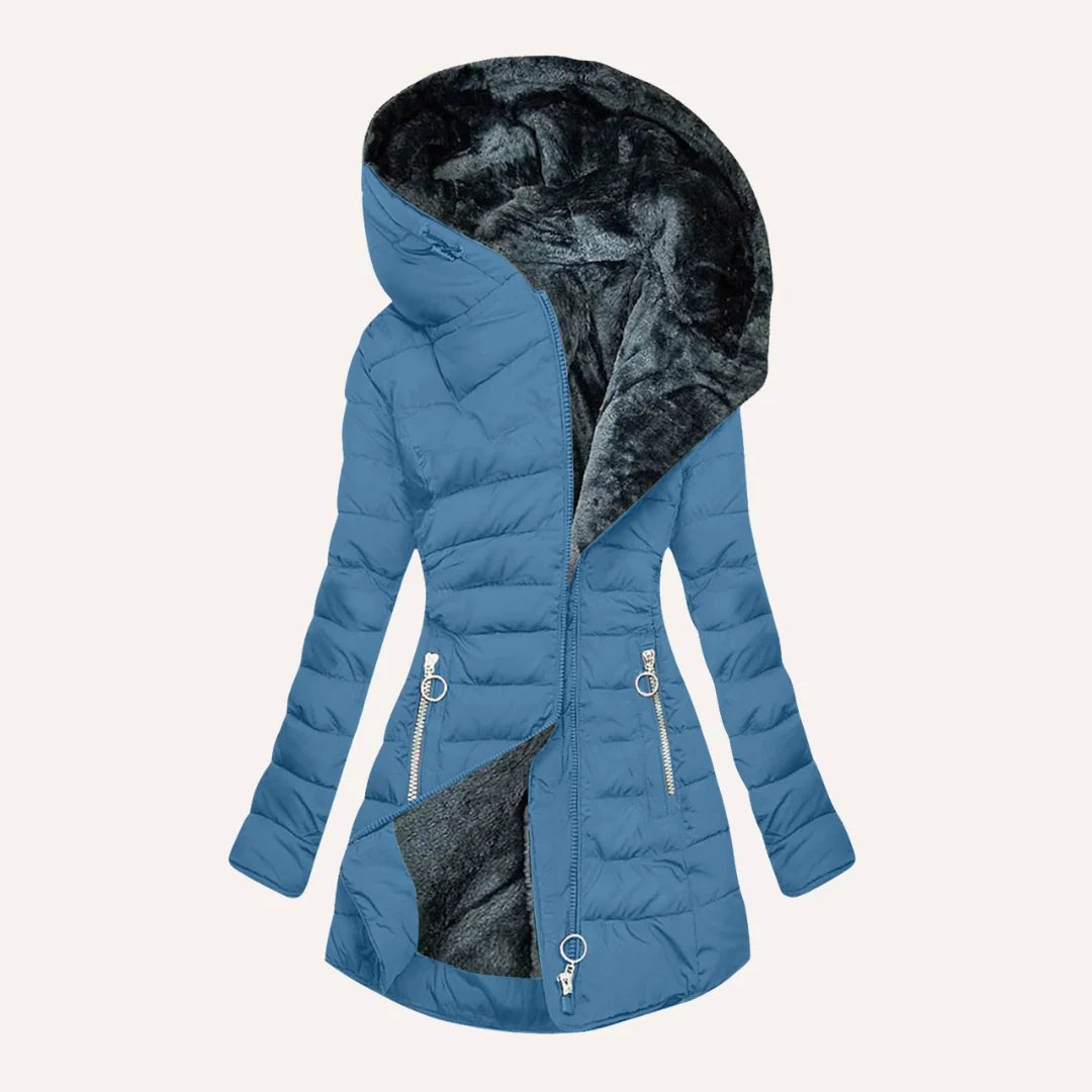 Women's quilted puffer jacket interior showing soft fleece lining in grey tones
