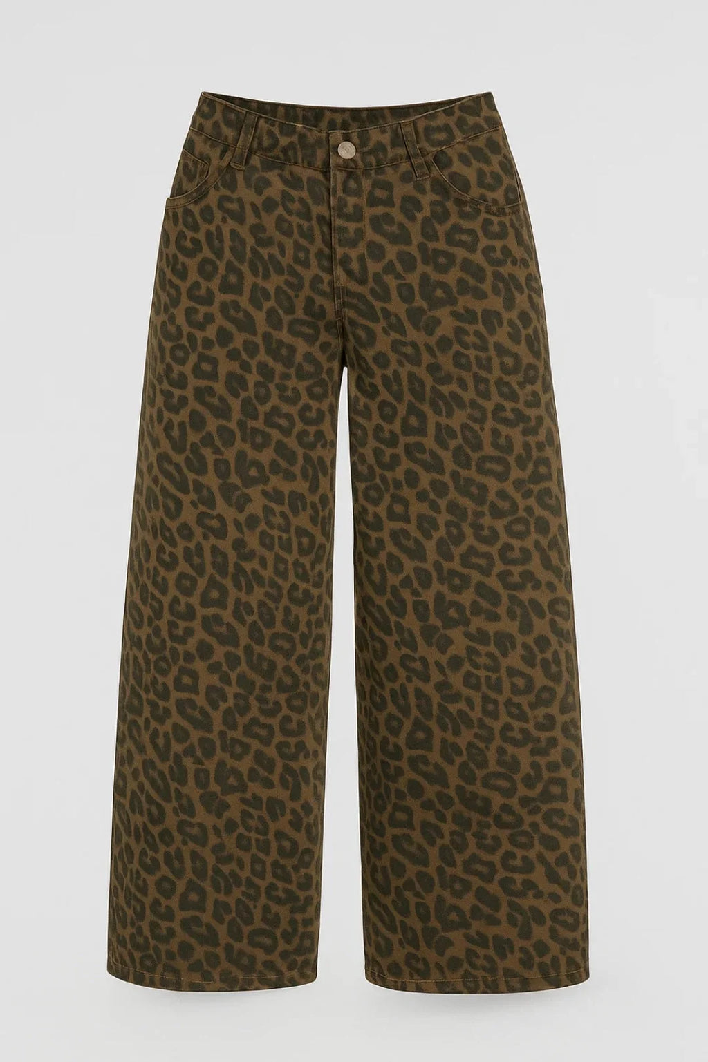 Close-up detail of leopard print wide leg trousers showing earthy brown tones and structured fabric drape