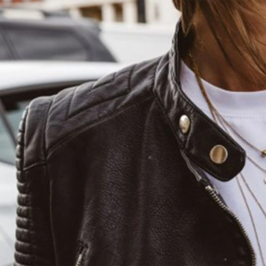 Women's biker jacket with snap collar fastenings and asymmetric zip closure