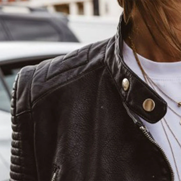 Women's biker jacket with snap collar fastenings and asymmetric zip closure