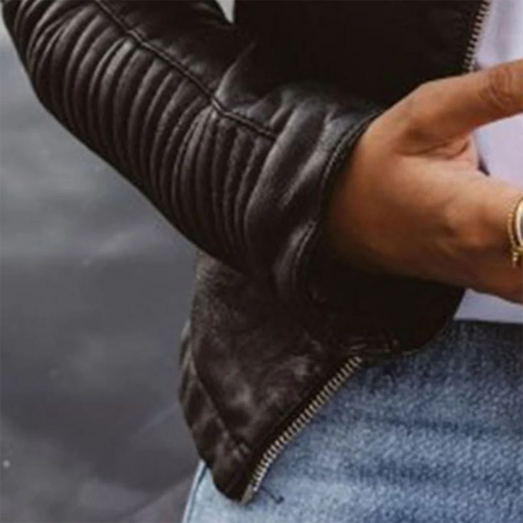Full view of women's biker jacket paired with casual outfit for everyday styling