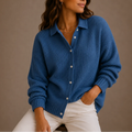 Women's ribbed knit cardigan with classic collar and button-up front in deep blue shade