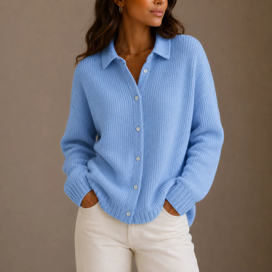 Close-up view of women's ribbed knit cardigan displaying button-through front and collar detail