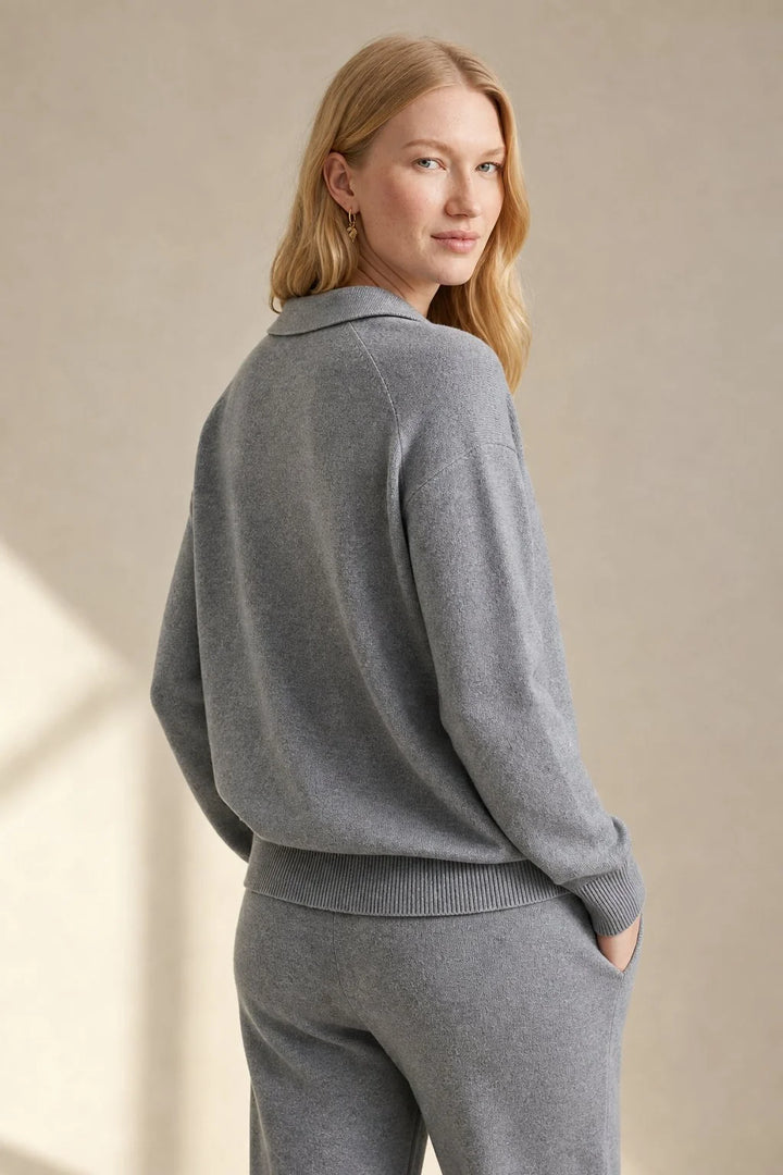 Detail of Merino lounge set ribbed cuffs and soft knit texture on jumper sleeves