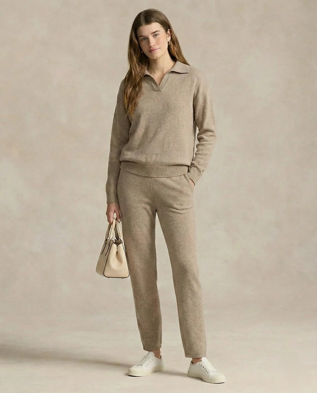 Woman in beige Merino lounge set styled with neutral background showing casual elegance