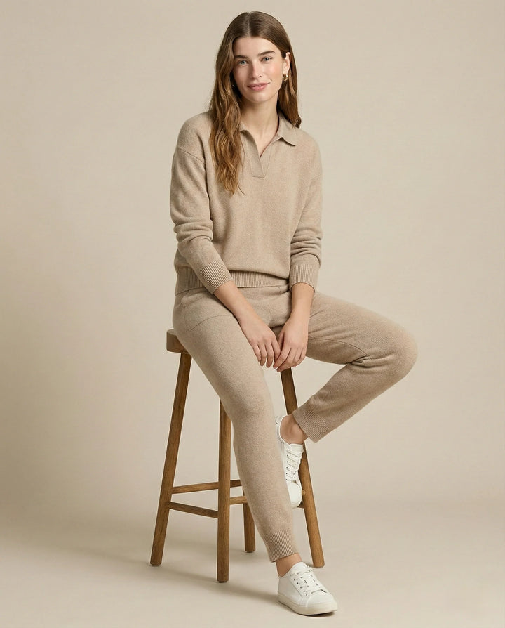 Full view of woman in beige Merino lounge set demonstrating relaxed fit and polo collar design