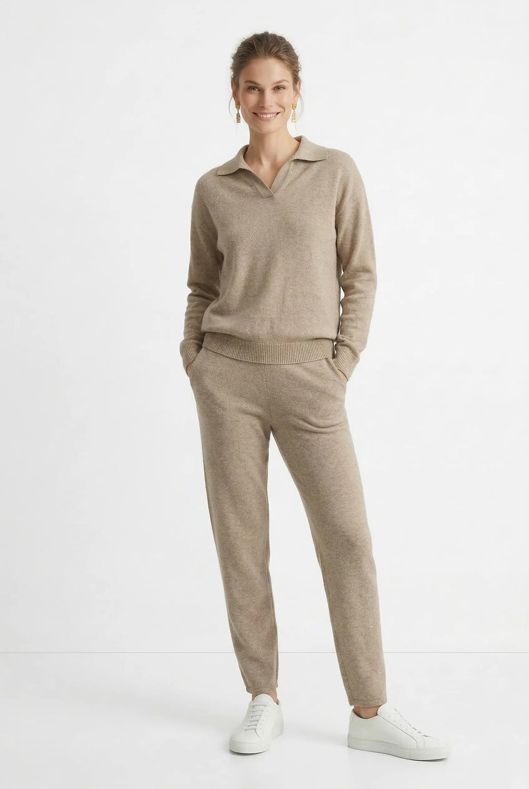Woman wearing beige Merino lounge set showing two-piece coordination and casual style